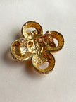 Gouden gevlochten broche
