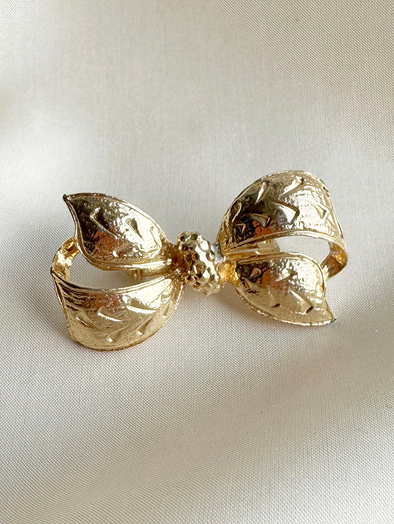 Gouden strik broche