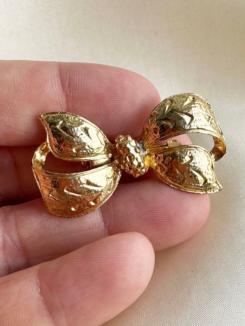 Gouden strik broche