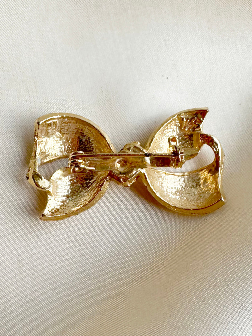 Gouden strik broche
