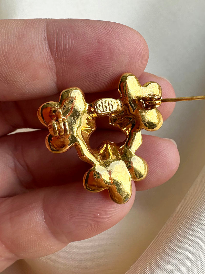 Broche met drie orchideeën