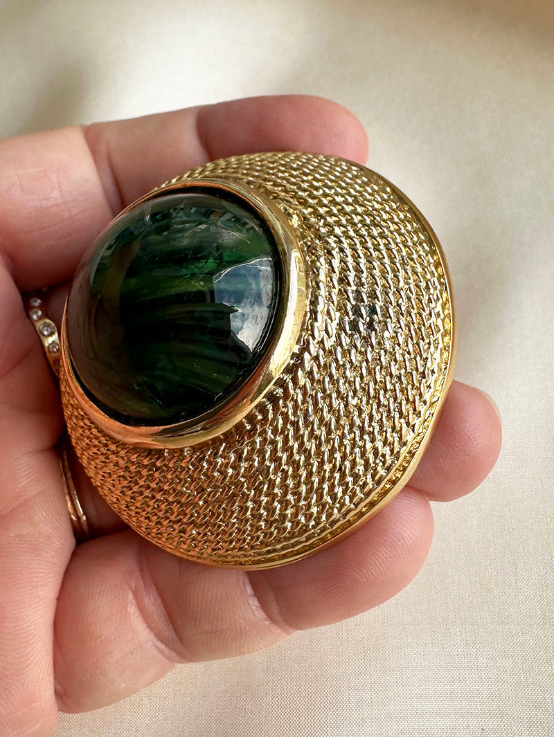 Grote broche met groene steen