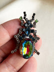 Kristalglazen kever broche
