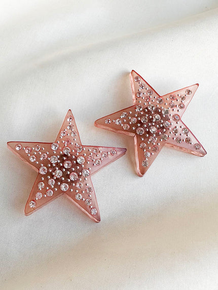 Roze ster clip oorbellen