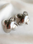 Zilveren statement clip oorbellen