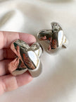 Zilveren statement clip oorbellen