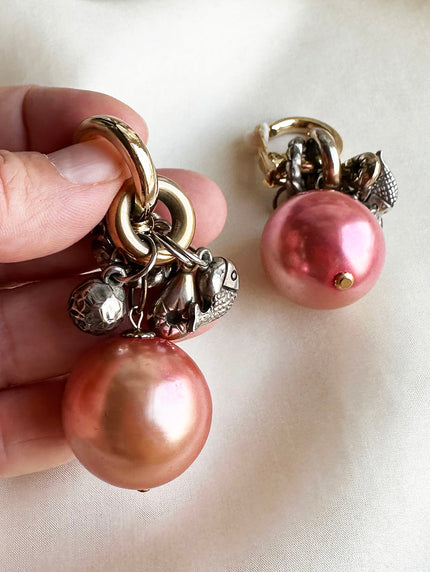 Clip oorhangers met bedels en roze parel