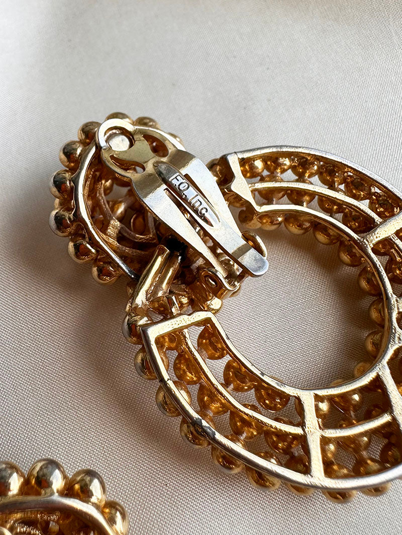 Gouden designer clip oorbellen