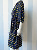 Overslagjurk met polkadots