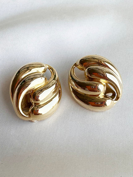 Gouden designer clip oorbellen