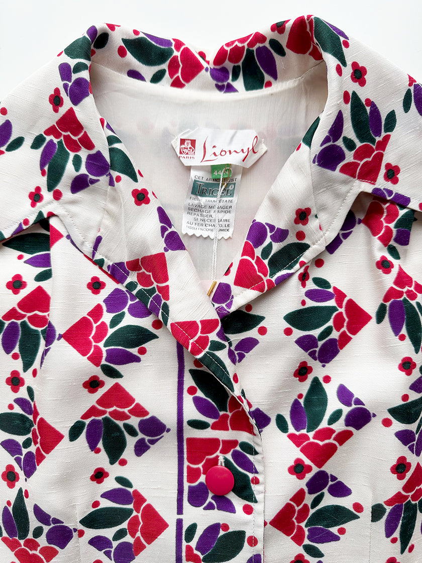 Mouwloze vintage printjurk