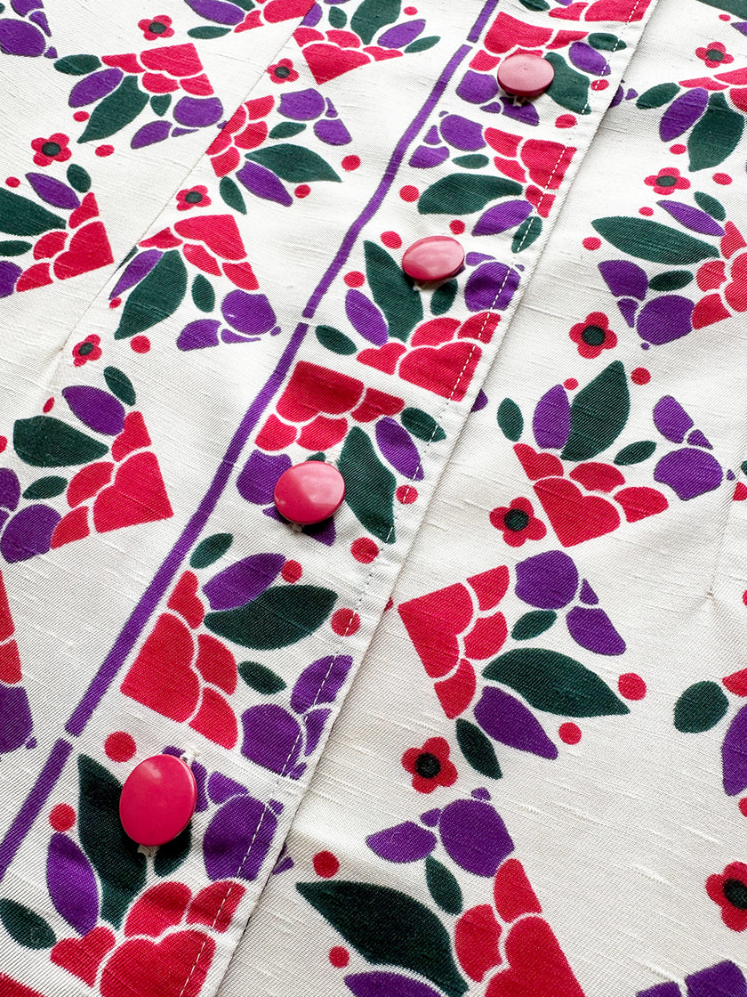 Mouwloze vintage printjurk