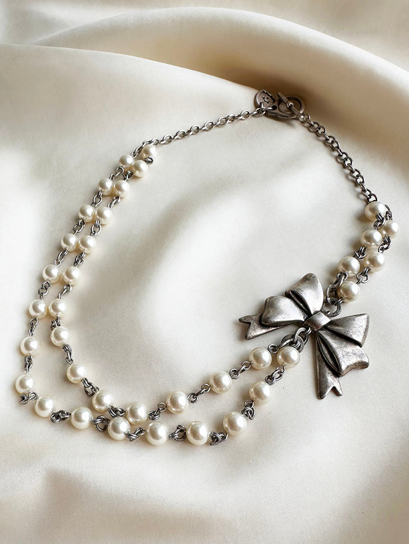 Parelcollier met strik