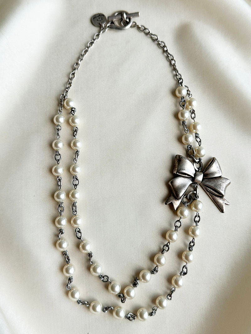 Parelcollier met strik