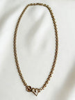Gouden collier met hartjes