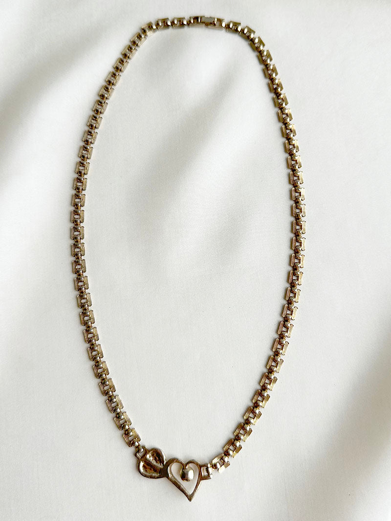 Gouden collier met hartjes