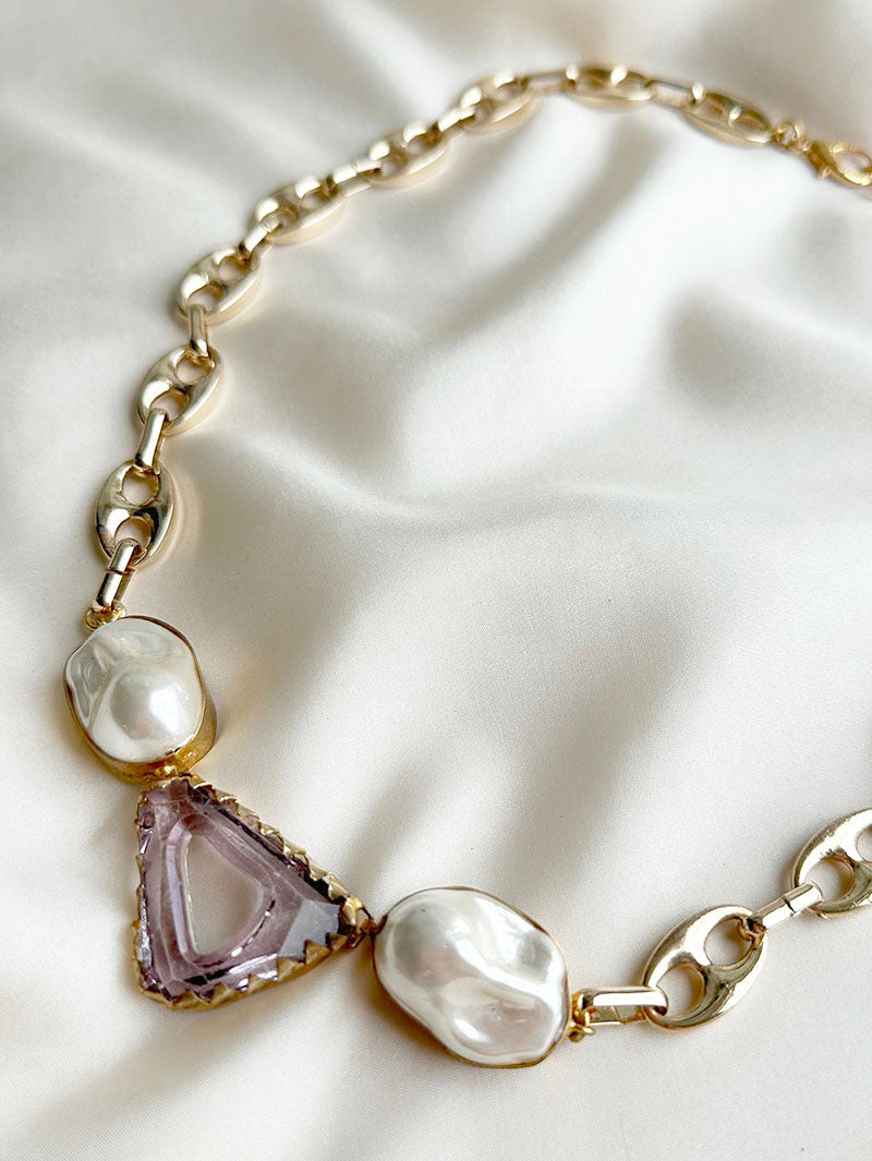 Gouden ketting met grote parels