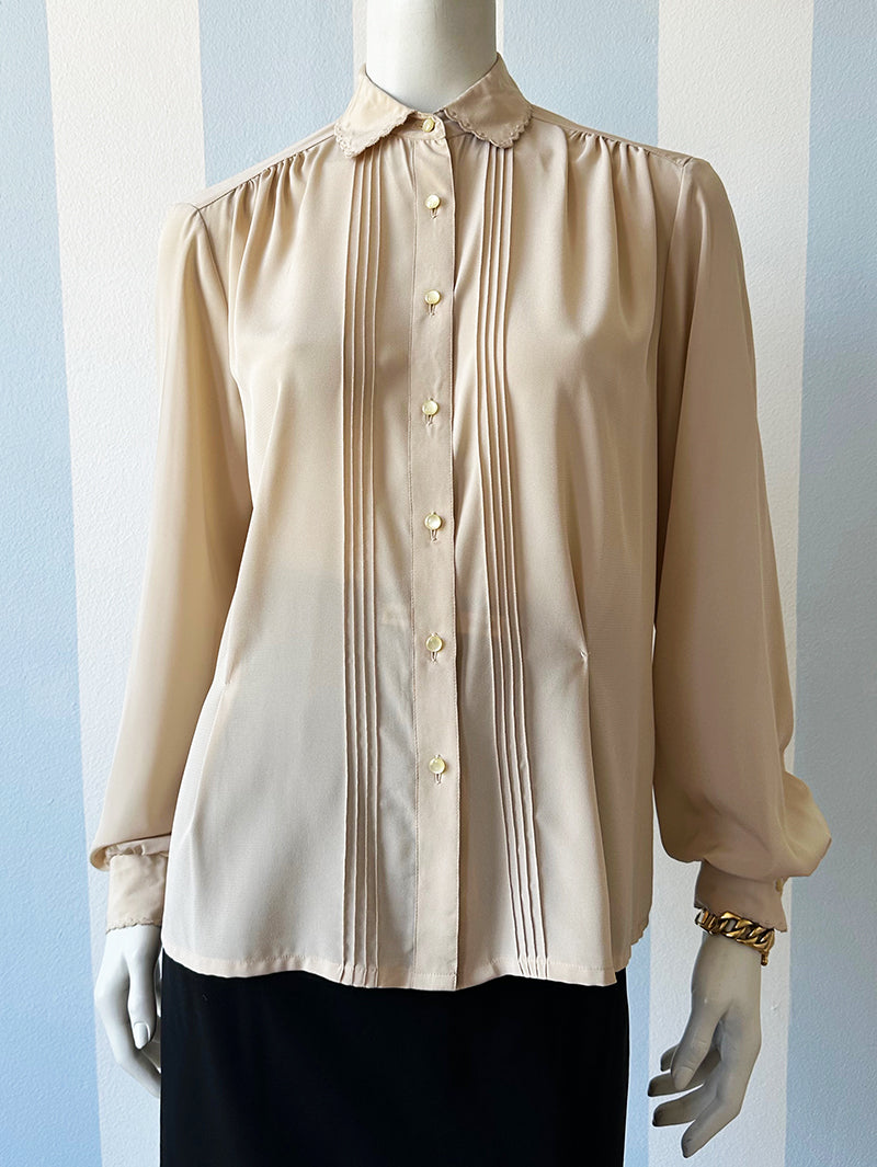 Ecru blouse met sierrandjes