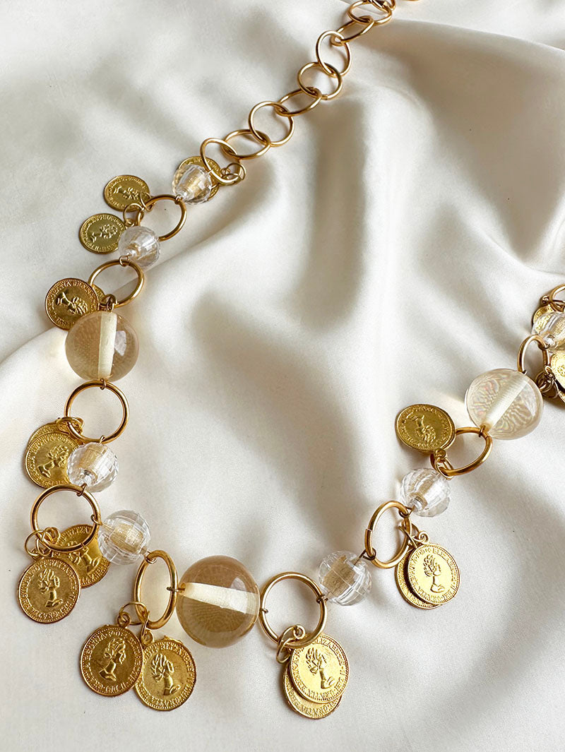 Gouden ketting met munten