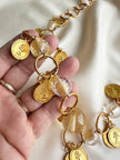 Gouden ketting met munten
