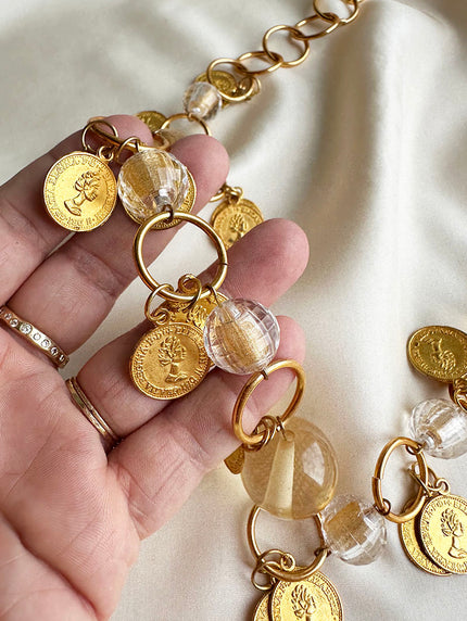Gouden ketting met munten