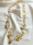 Gouden ketting met munten