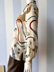Blouse met juwelendessin