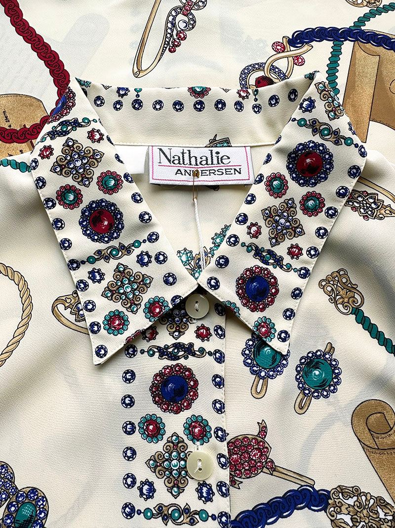 Blouse met juwelendessin