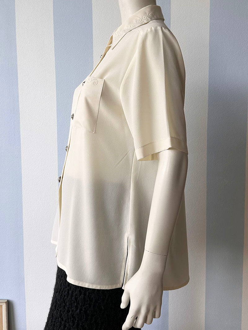 Off-white blousje met borduursels