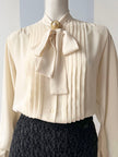 Roomkleurige strikblouse