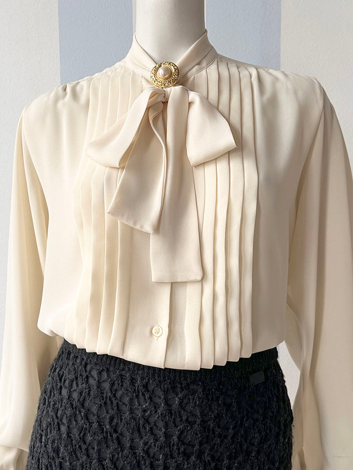 Roomkleurige strikblouse