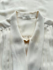 Roomkleurige strikblouse