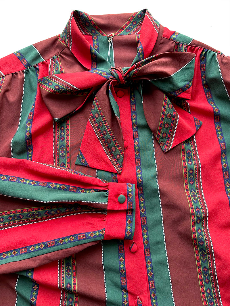 Vintage gestreepte strikblouse