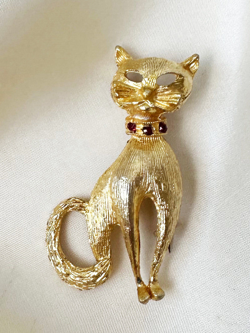Gouden poes broche