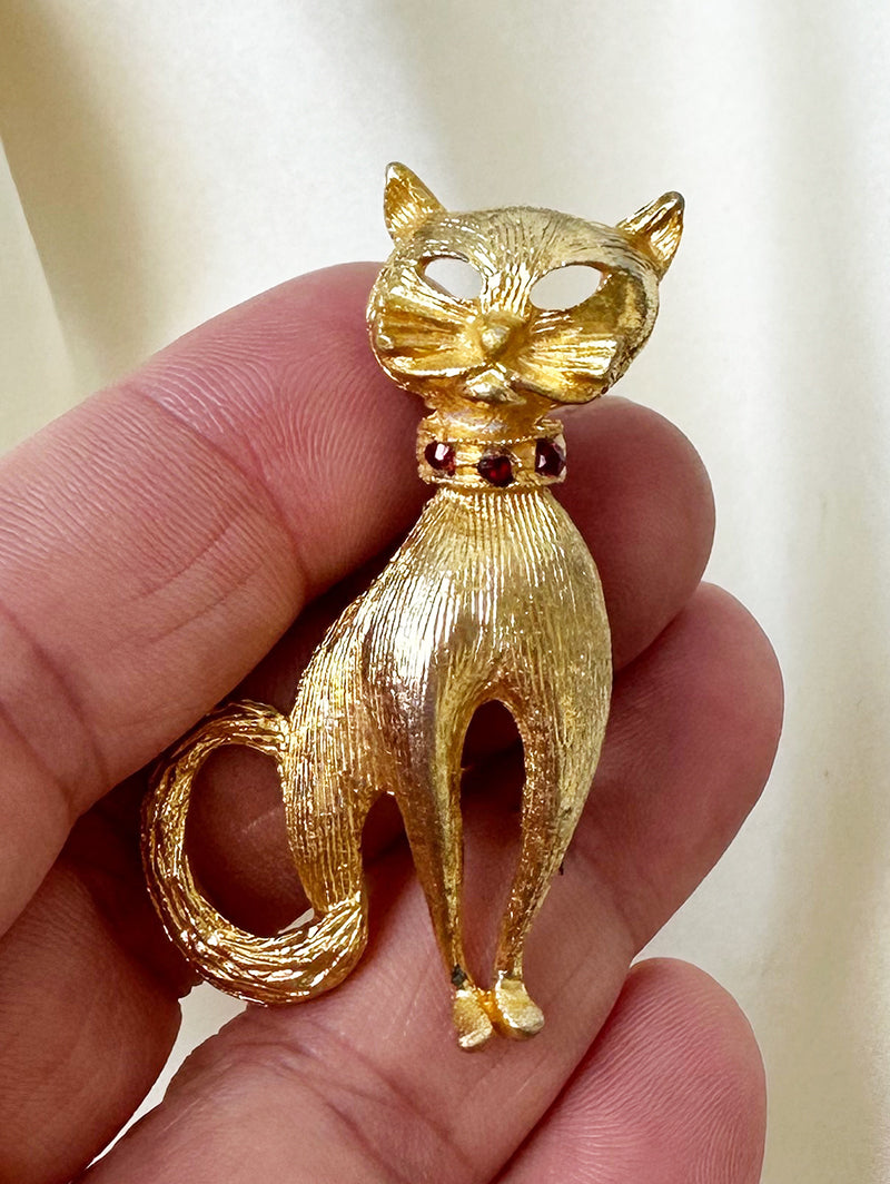 Gouden poes broche