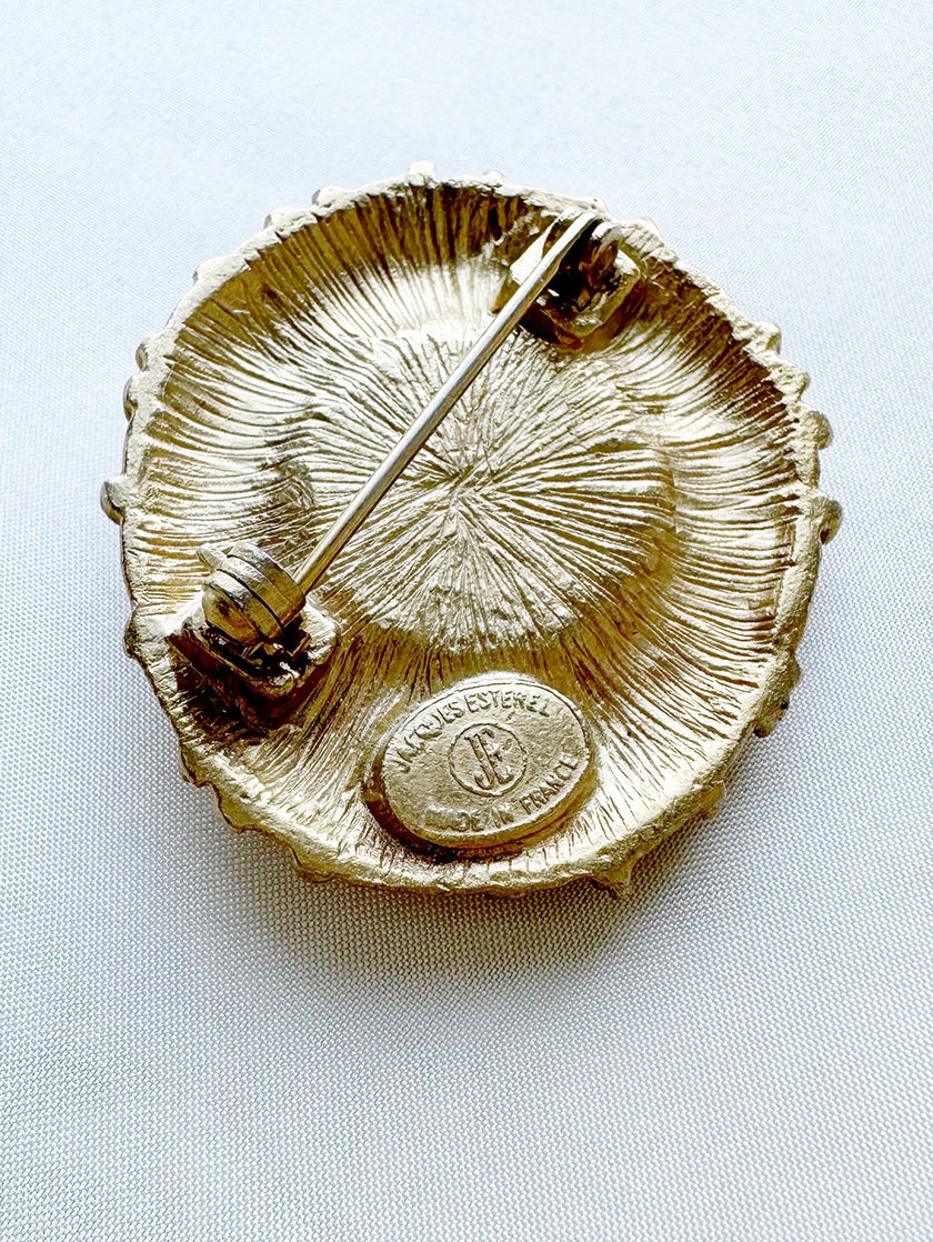 Vergulde designer broche