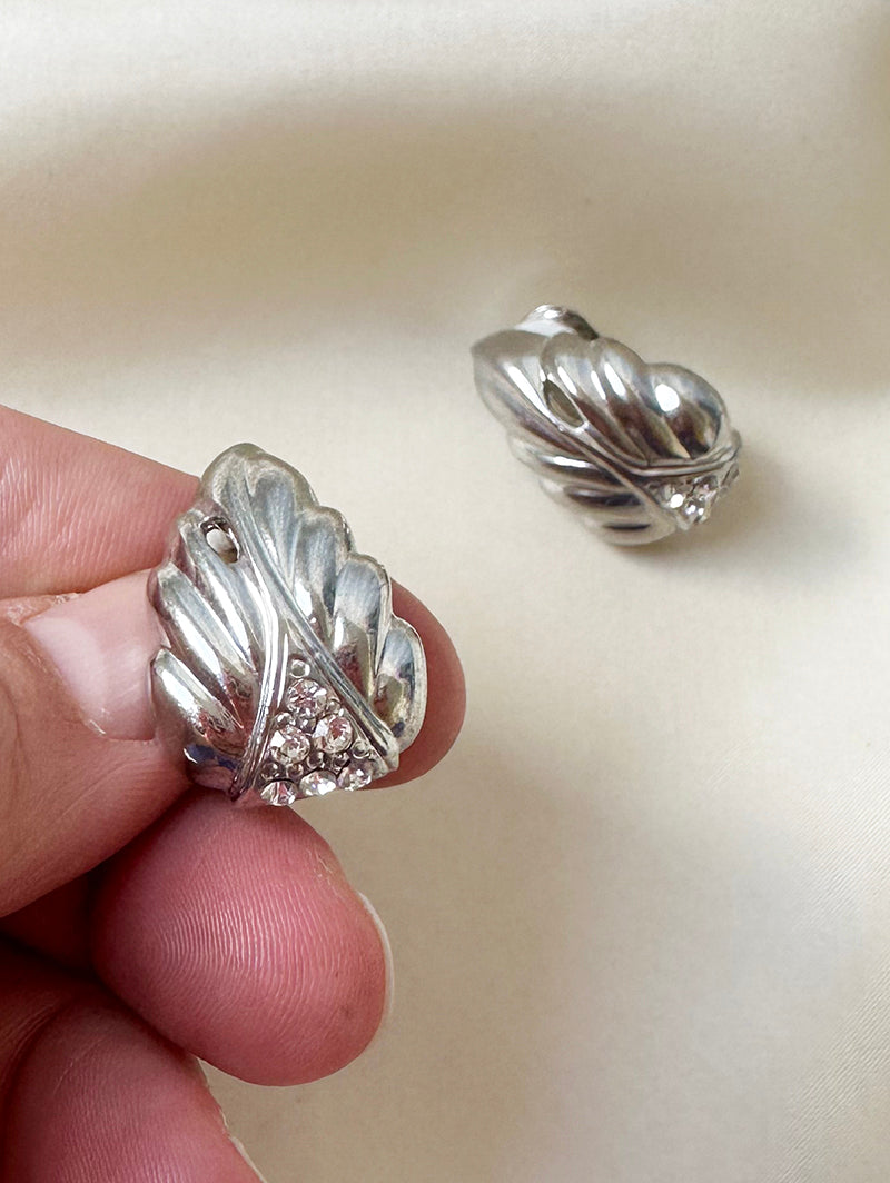 Zilveren blaadjes clip oorbellen