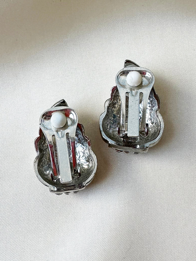 Zilveren blaadjes clip oorbellen