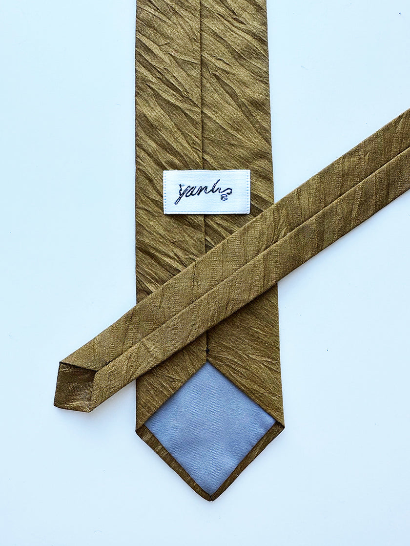 Smalle goudkleurige stropdas