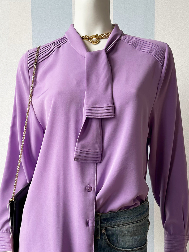 Paarse strikblouse