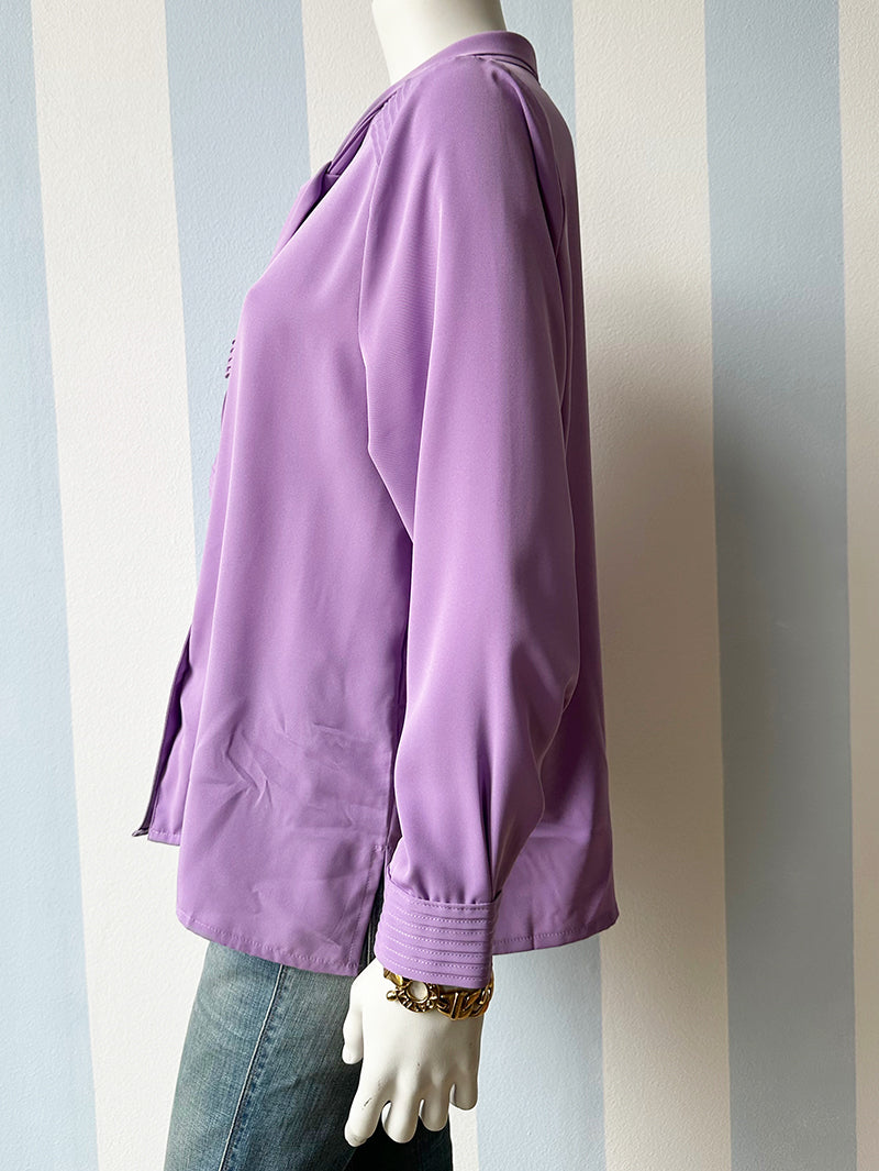 Paarse strikblouse