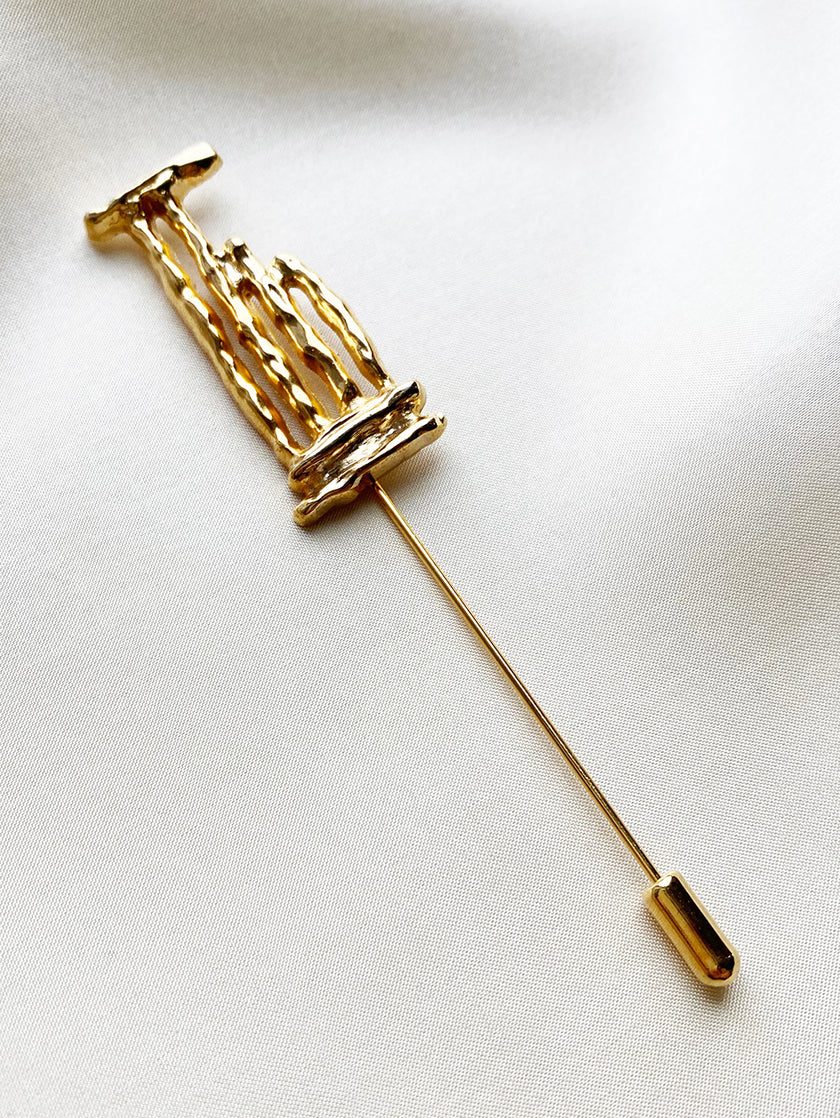 Vergulde dasspeld