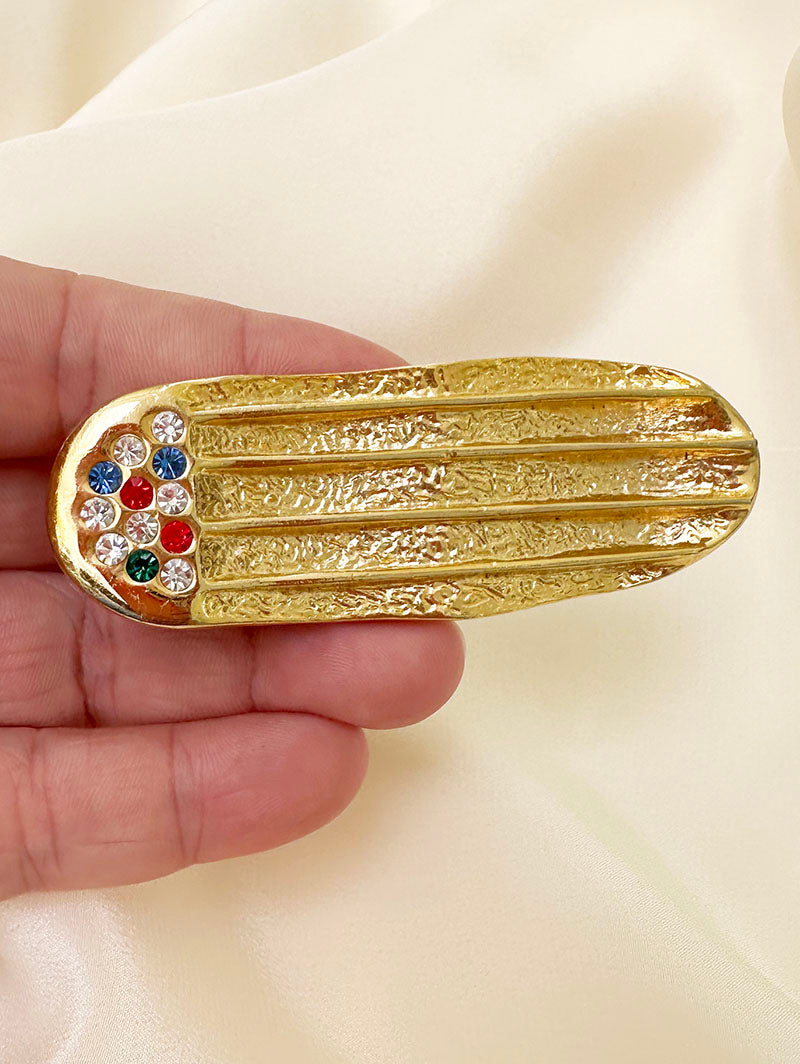 Vergulde ovale broche met strass