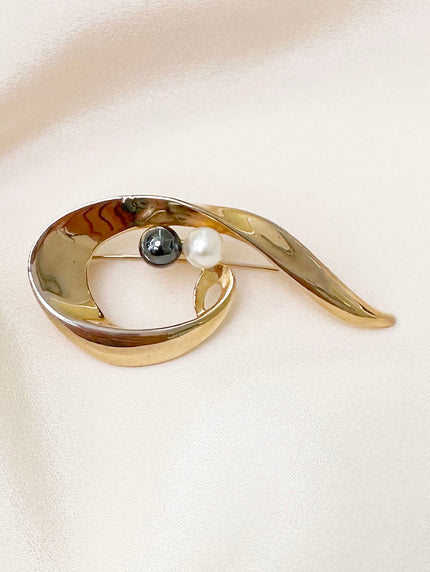 Gouden broche met parels