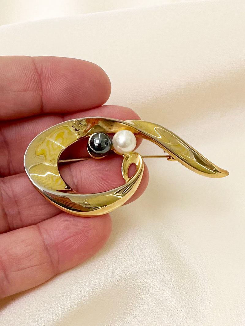 Gouden broche met parels