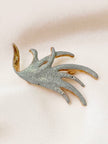 Vergulde glitter broche