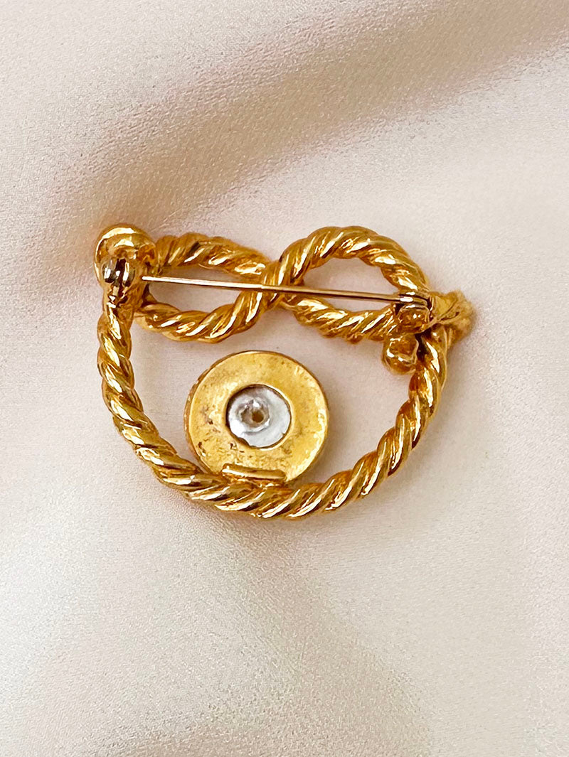 Vergulde broche met faux parel