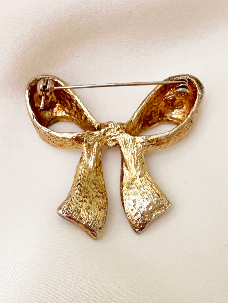 Goud/zilveren strik broche
