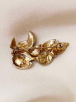 Groen/gouden takje broche