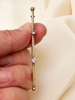 Lange smalle designer broche